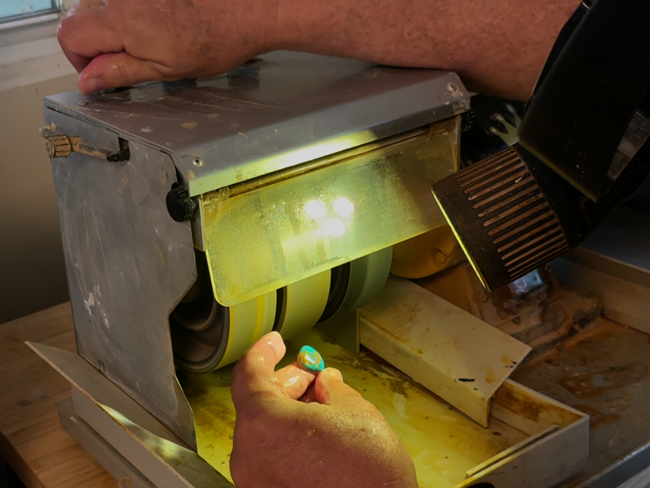 Developing the turquoise cabochon shape at the wheel