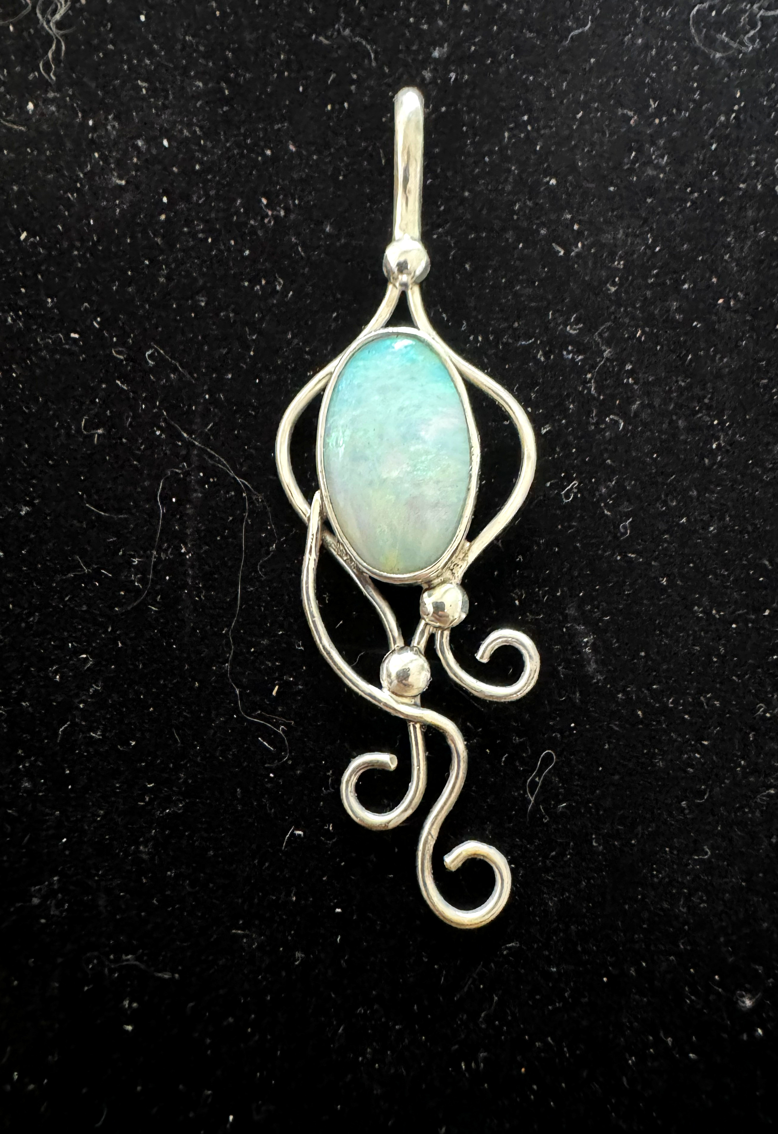 Art Nouveau-inspired fabricated opal pendant